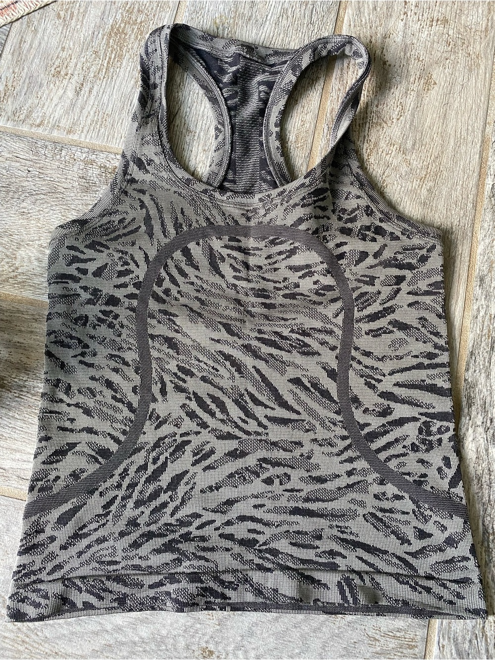 Lululemon 4 Zebra-Print Racerback Tank Top swiftly